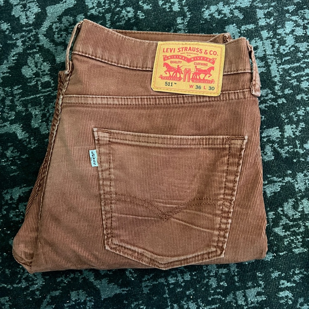 Levi’s 511 cords - great burnt orange/brick color.